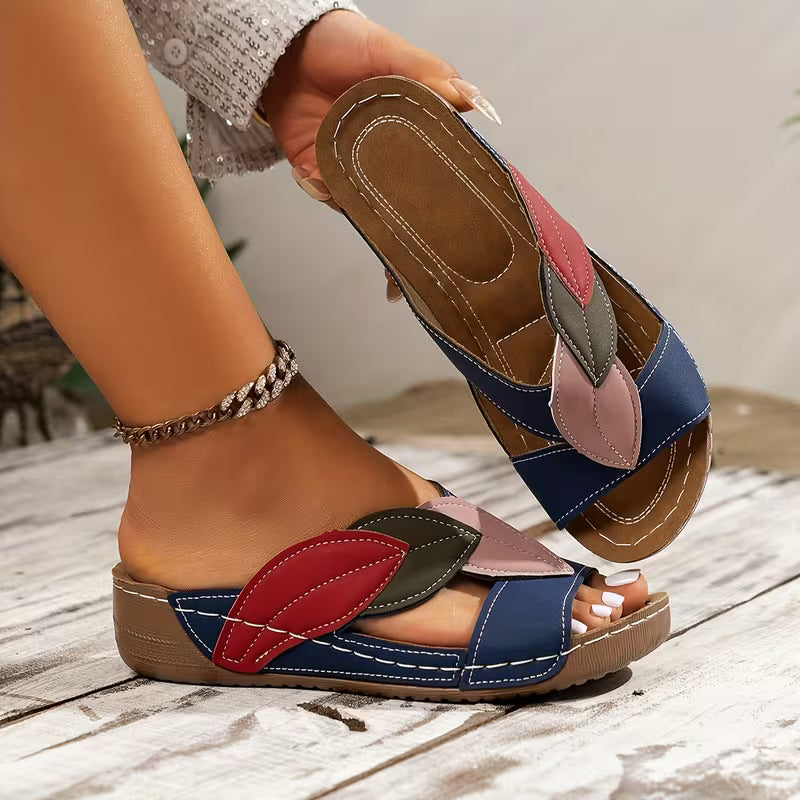 A Pair of Women's Fashion Leaf Pattern Slippers